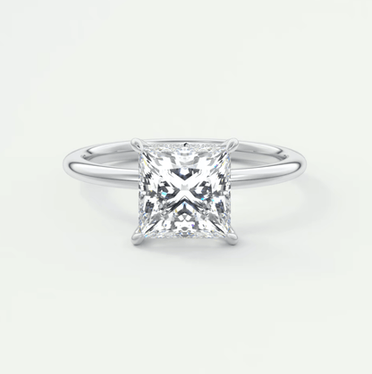 Princess cut diamond engagement ring with white gold band.