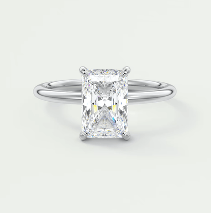 18k white gold emerald cut diamond engagement ring.
