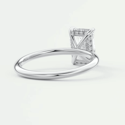 18k white gold diamond engagement ring with a princess cut center stone and pave set diamonds on the band.
