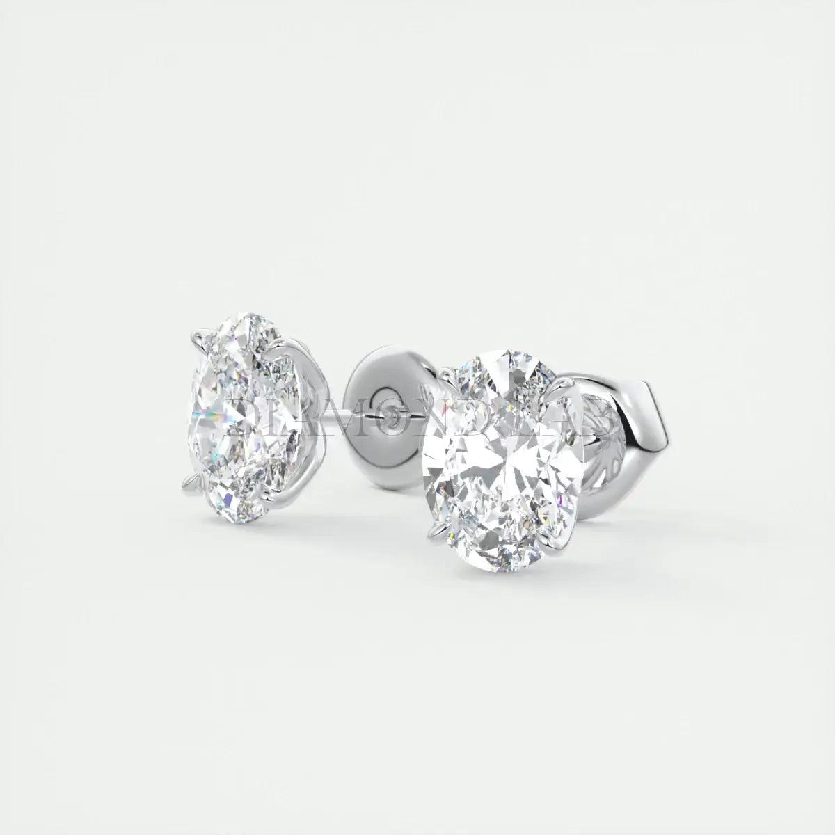 18k white gold diamond stud earrings.