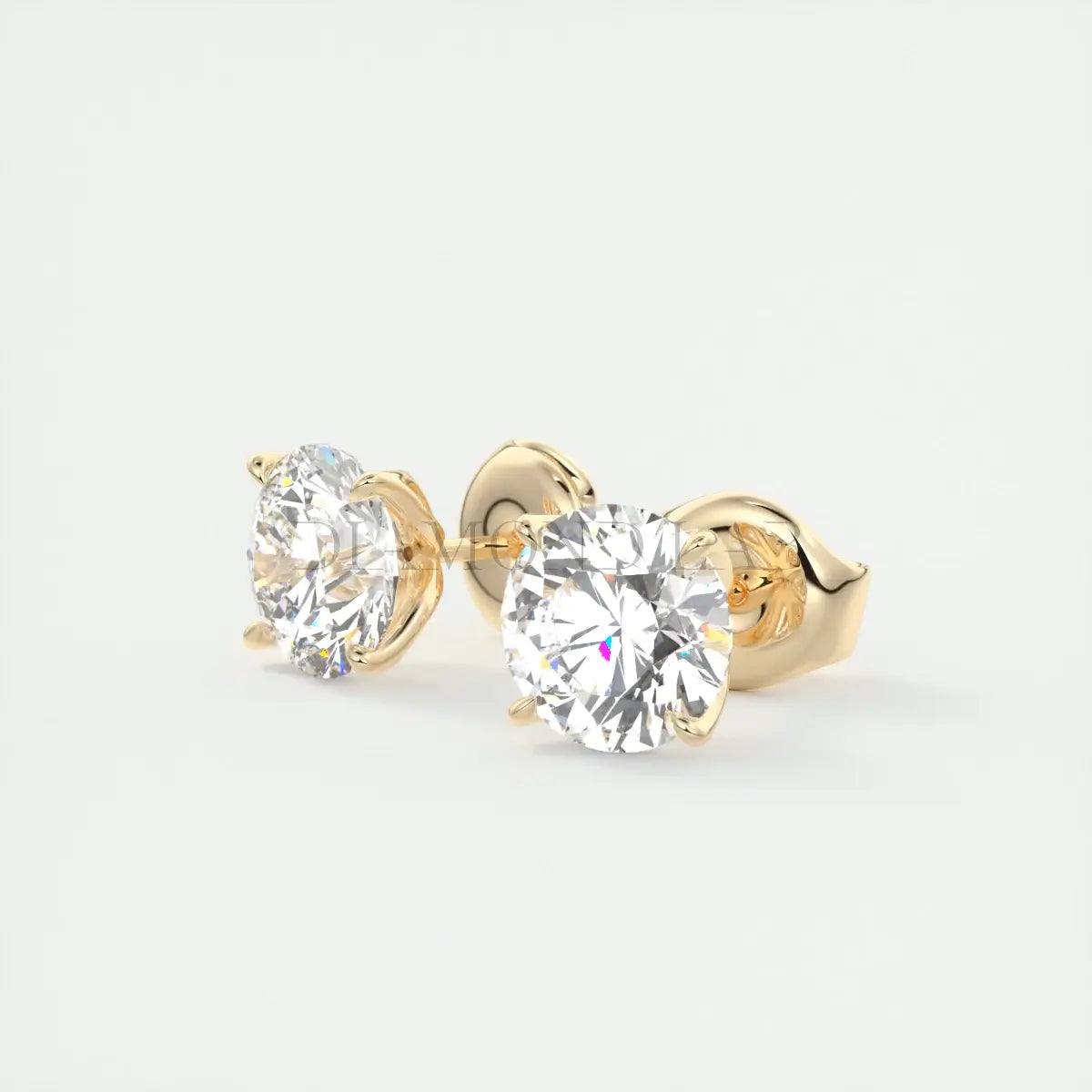 14k gold diamond stud earrings with a classic round cut.