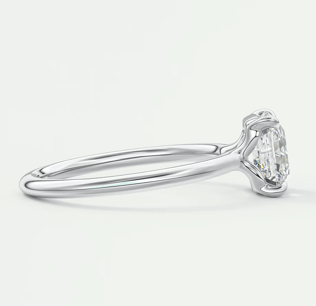 18k white gold diamond engagement ring with a round brilliant cut gemstone.