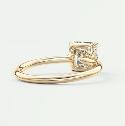 18k gold engagement ring with princess cut diamond.