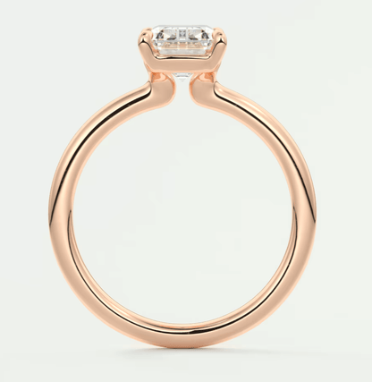 18k rose gold emerald cut diamond engagement ring.