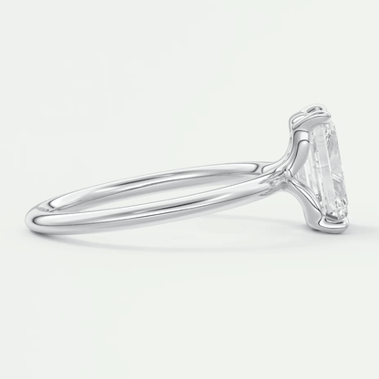 18k white gold solitaire engagement ring with a princess cut diamond.