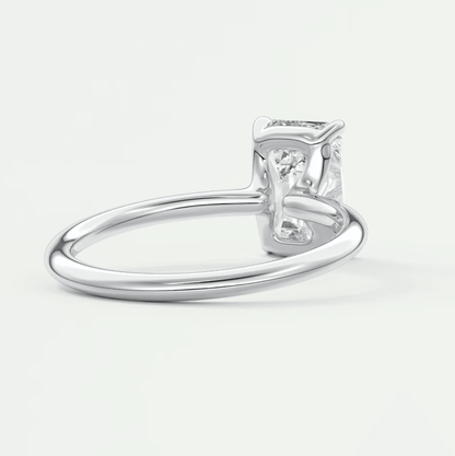 Silver diamond engagement ring with a solitaire setting.