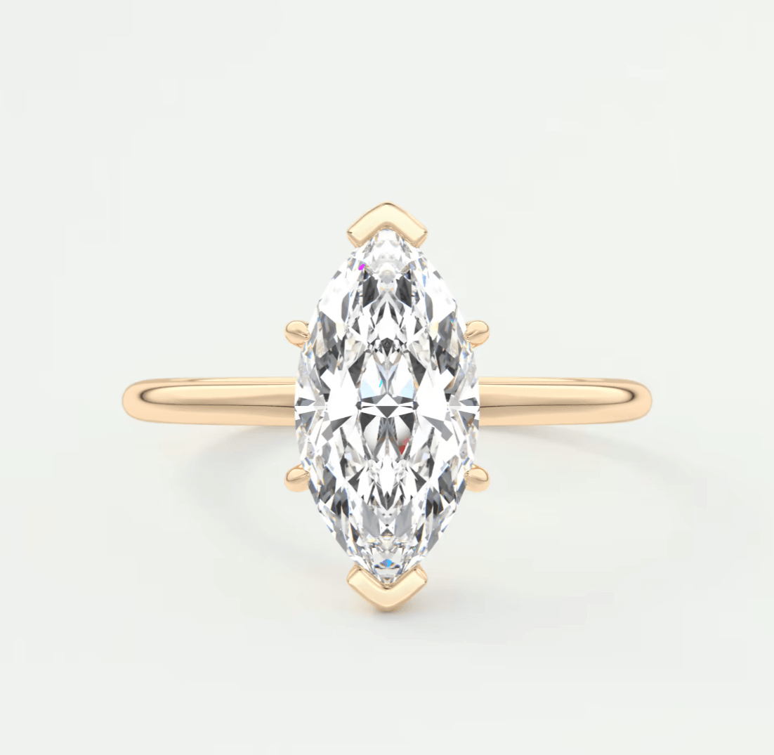 18-karat gold marquise-cut diamond engagement ring.