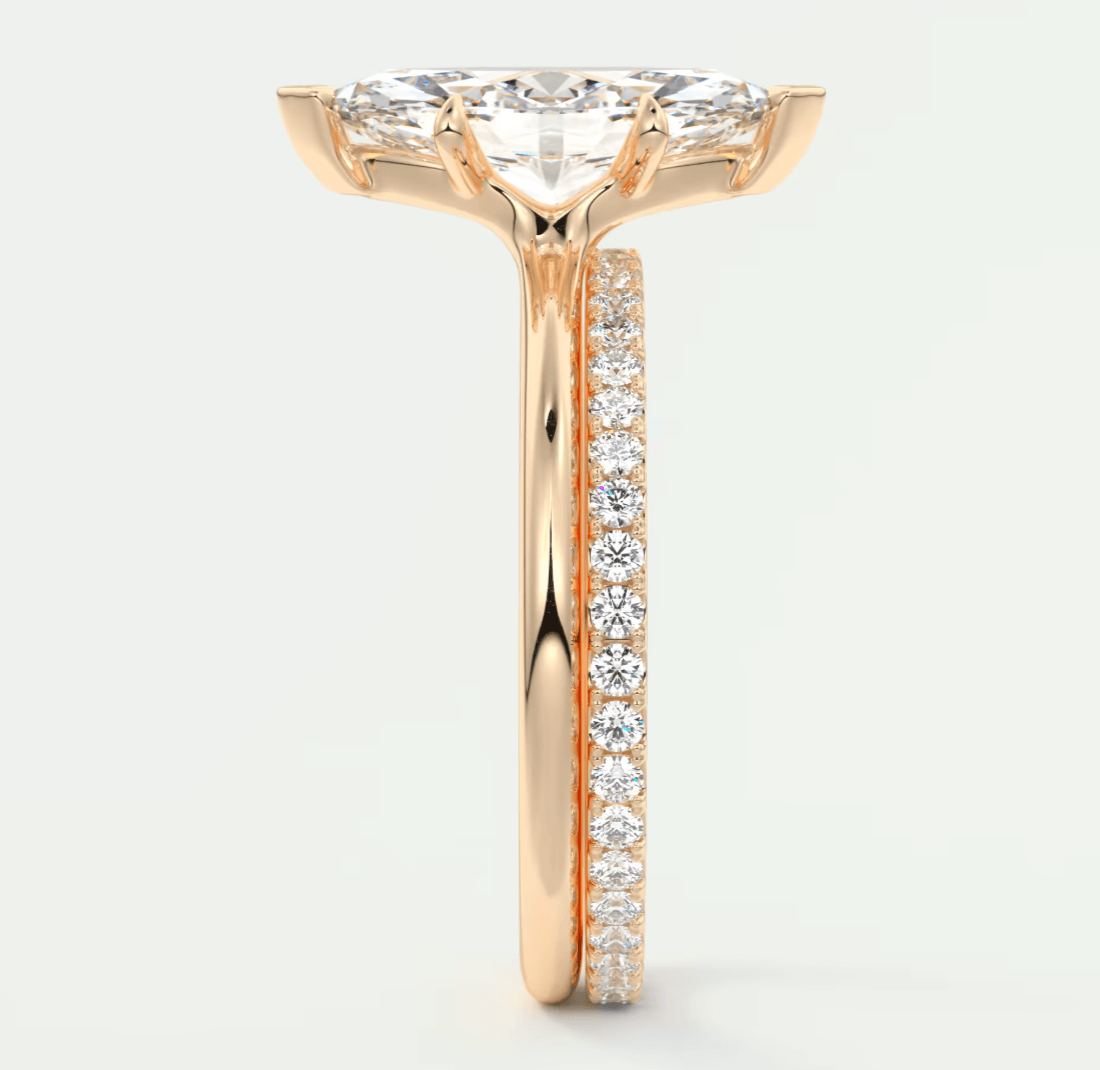 18k rose gold princess cut diamond engagement ring with a pave band.