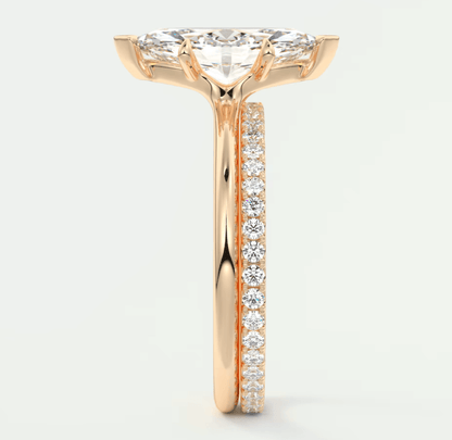 18k rose gold princess cut diamond engagement ring with a pave band.