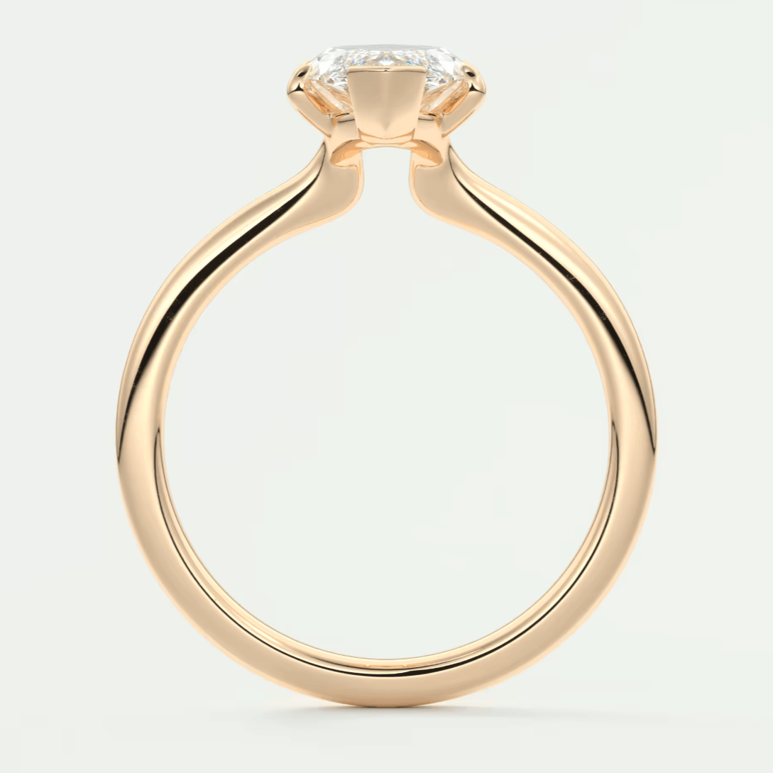 18k yellow gold engagement ring with a princess cut diamond.