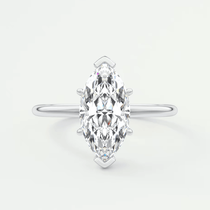 Marquise-cut diamond engagement ring with white gold band and prong setting.