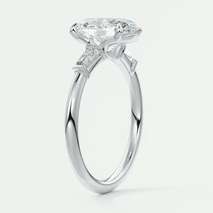 18-karat white gold engagement ring with a round diamond center and smaller diamonds on the band.