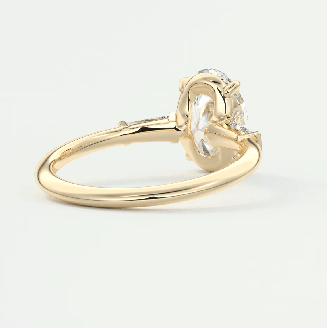 18k yellow gold engagement ring with a round diamond center stone and three smaller diamonds on each side.