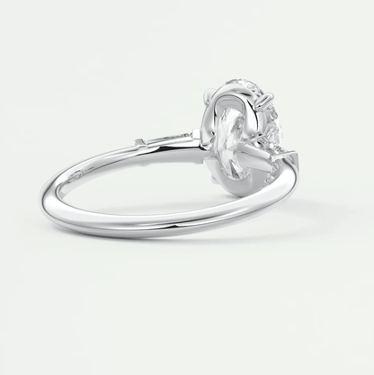 Silver diamond engagement ring with a solitaire design and prong setting.