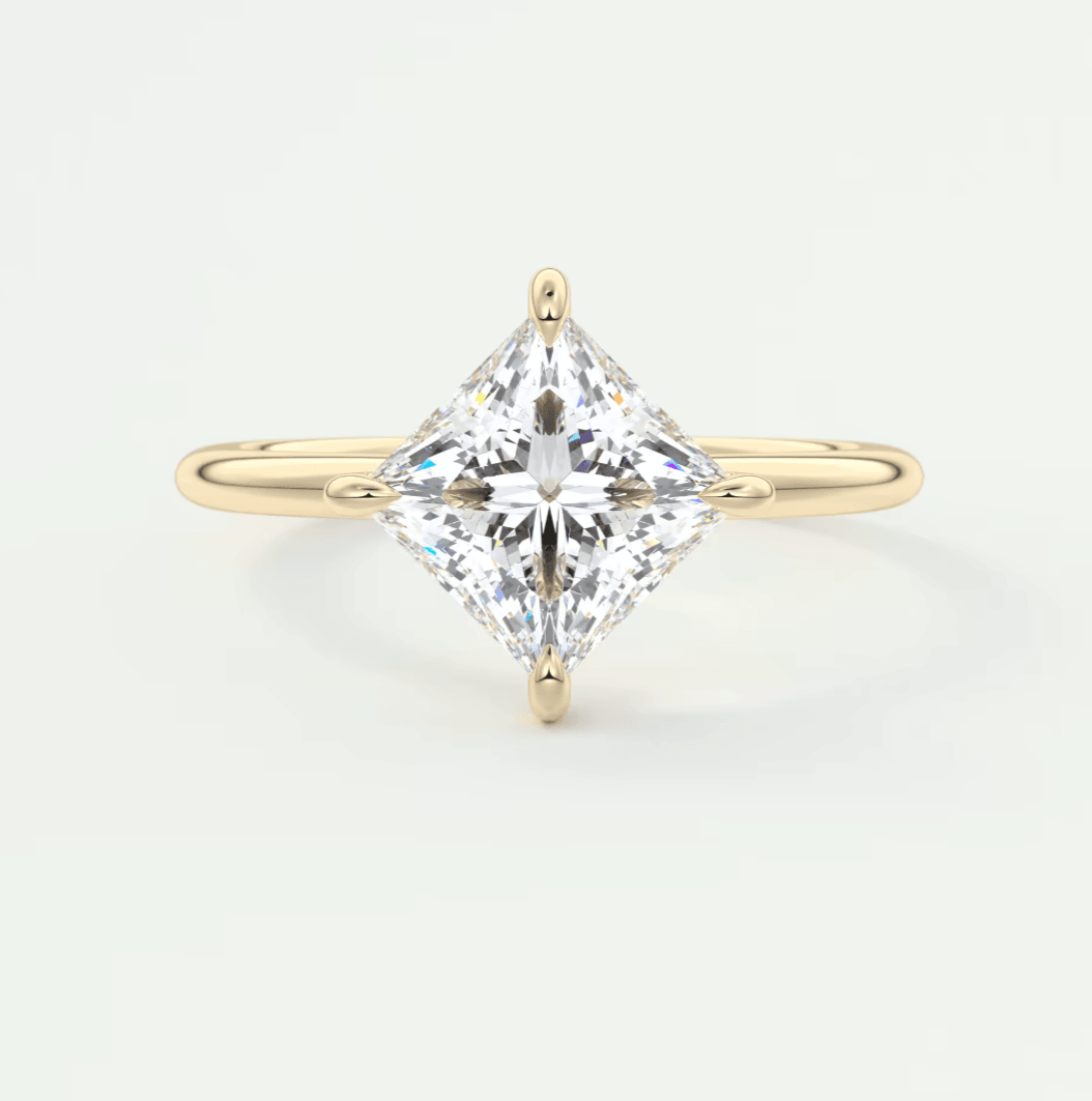 18k yellow gold princess cut diamond engagement ring.