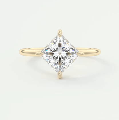 18k yellow gold princess cut diamond engagement ring.