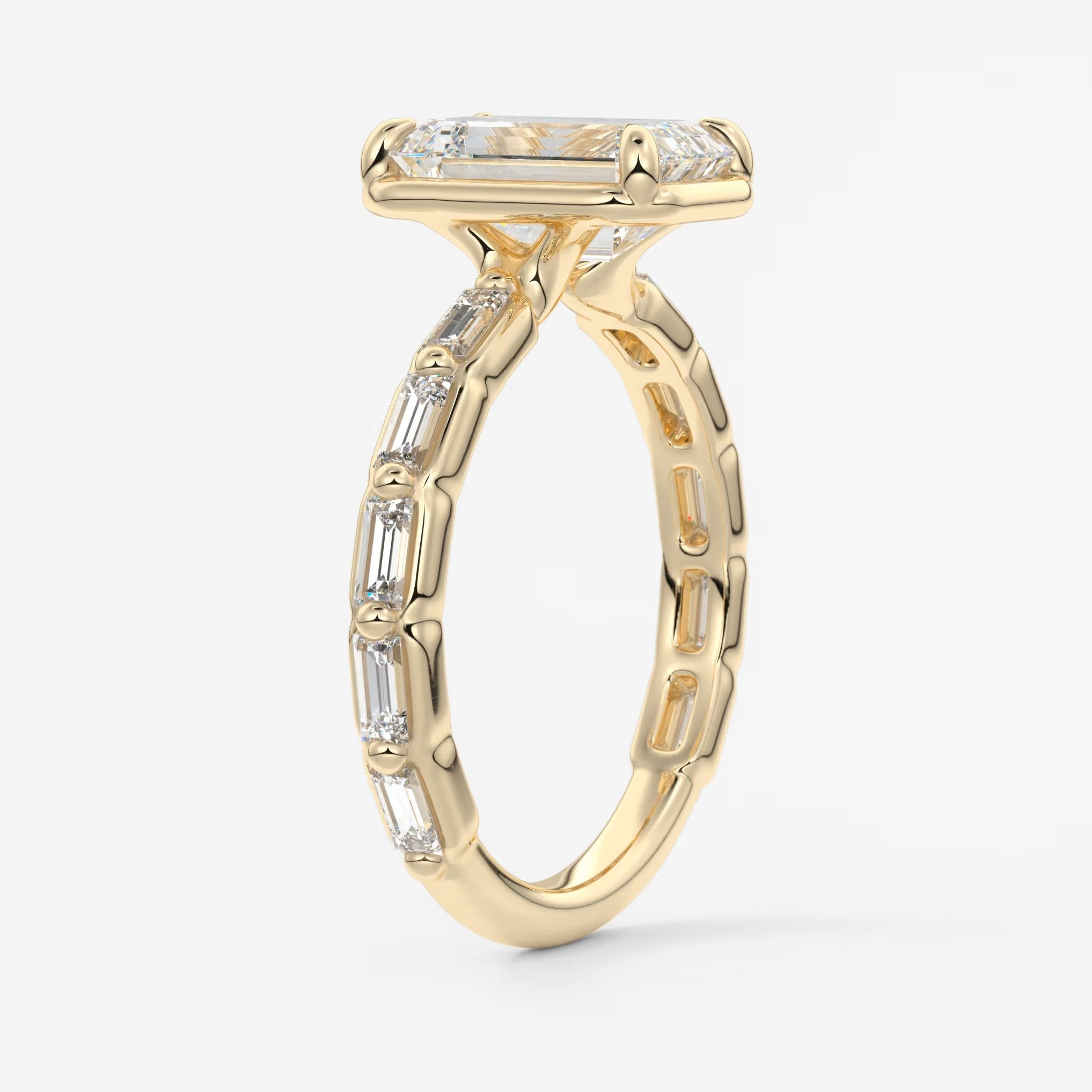 Isadora emerald bezel baguette engagement ring