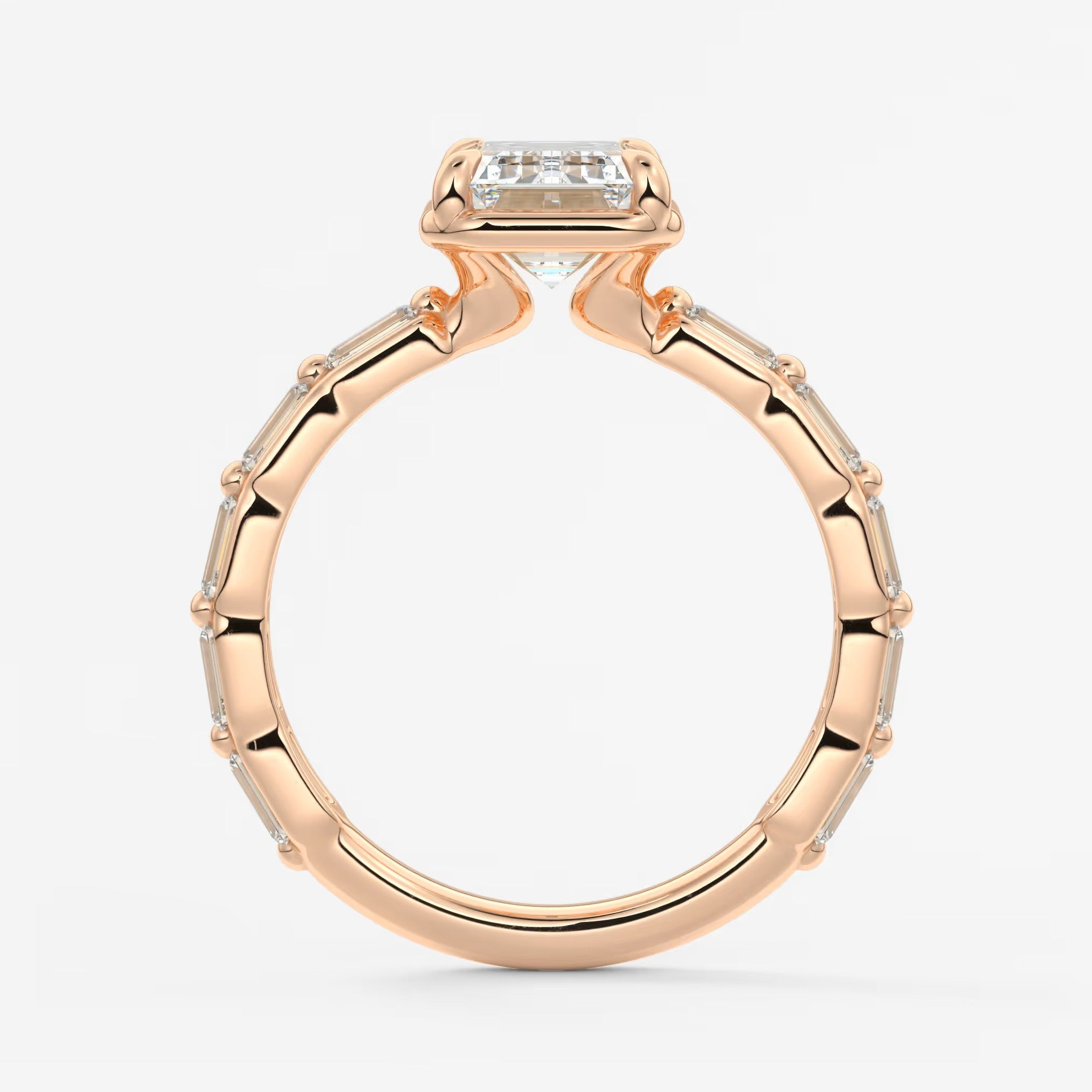 Isadora emerald bezel baguette engagement ring