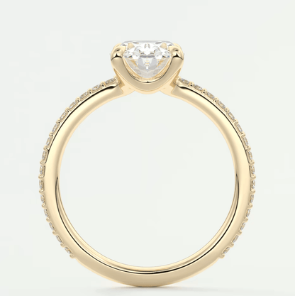 18k yellow gold engagement ring with a princess cut diamond and pave set diamonds on the band.