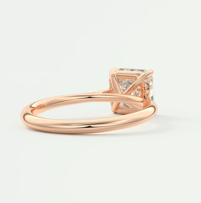 18-karat rose gold princess-cut diamond engagement ring.