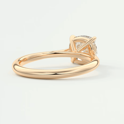 18k rose gold engagement ring with a princess cut diamond.