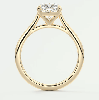 18k yellow gold engagement ring with a princess cut diamond.