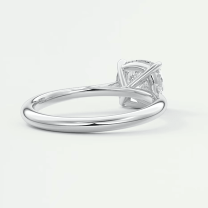 18-karat white gold engagement ring with a princess-cut diamond.