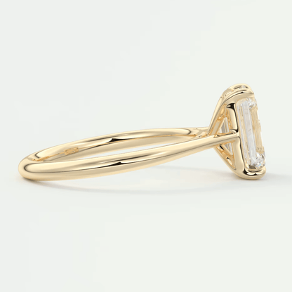 18k yellow gold emerald-cut diamond engagement ring.