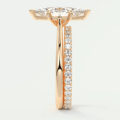 18-karat rose gold diamond engagement ring with a princess-cut center stone and pave-set diamonds on the band.