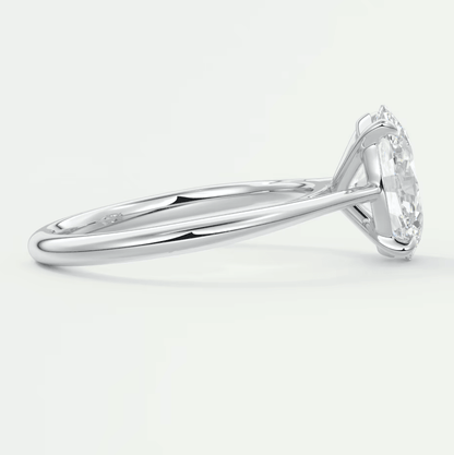 18k white gold diamond engagement ring with a round brilliant cut stone.