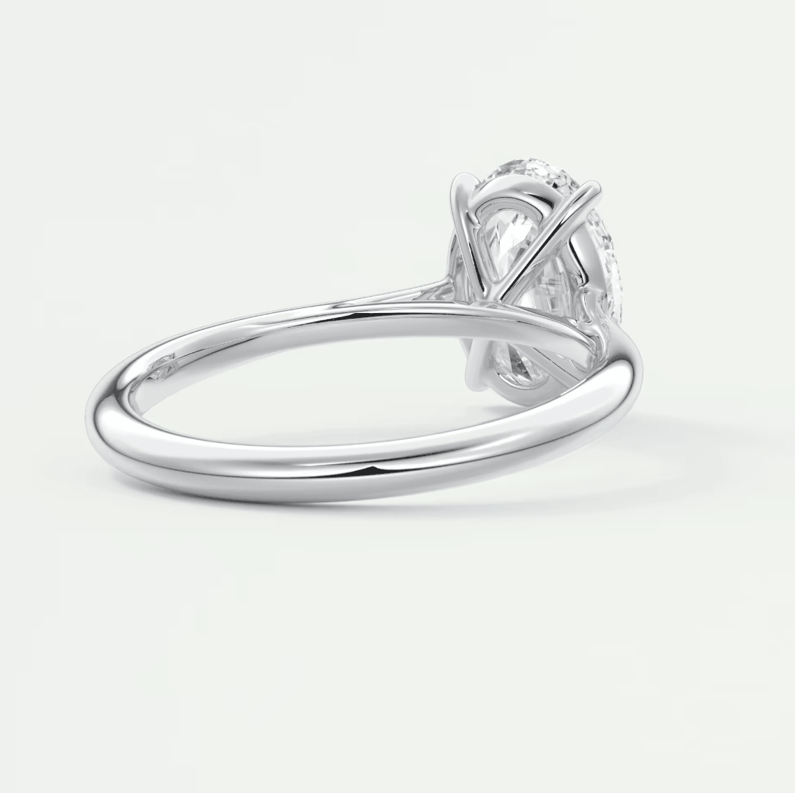 18-karat white gold engagement ring with a princess-cut diamond.
