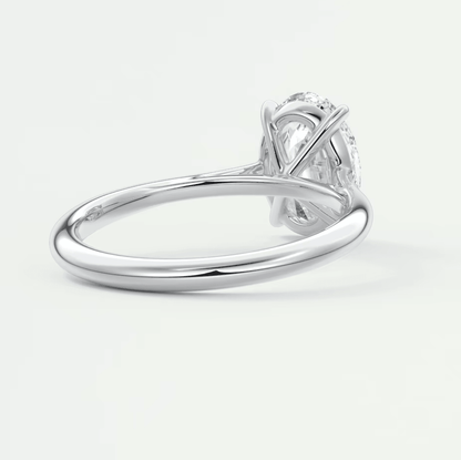 18-karat white gold engagement ring with a princess-cut diamond.