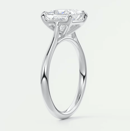 White gold solitaire engagement ring with princess cut diamond.