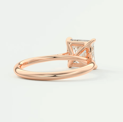 18-karat rose gold princess-cut diamond engagement ring.