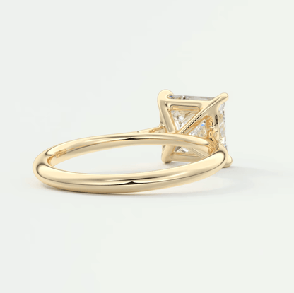 18k yellow gold princess cut diamond engagement ring.