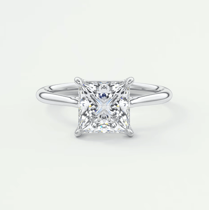 Princess cut diamond engagement ring with white gold band.
