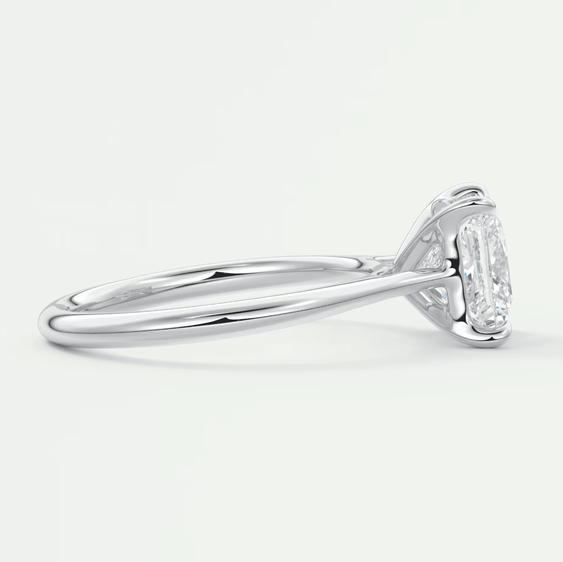 18k white gold emerald cut diamond engagement ring with a halo design.