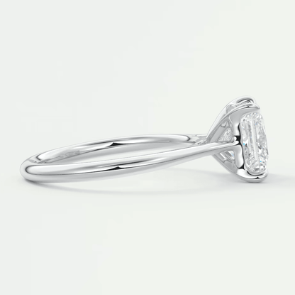 18k white gold emerald cut diamond engagement ring with a halo design.