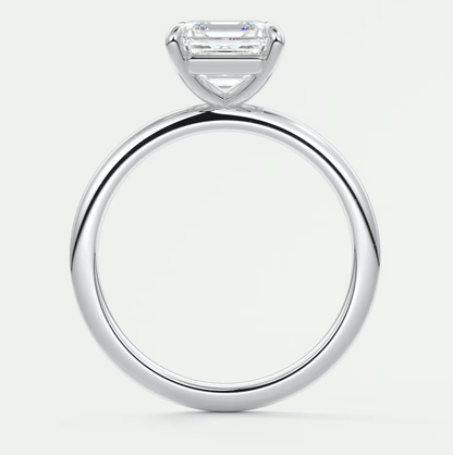 18k white gold engagement ring with a princess cut diamond.