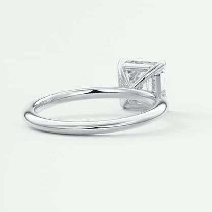 White gold princess cut diamond engagement ring with a sleek band design.