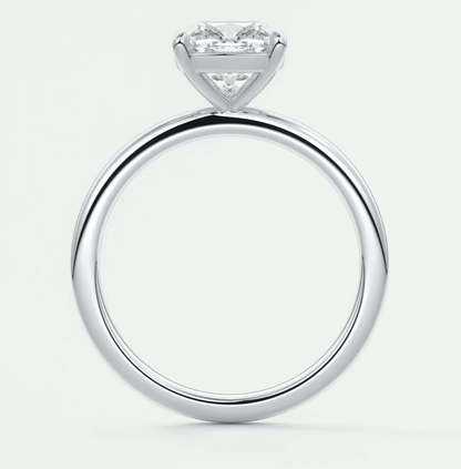 18k white gold solitaire engagement ring with a princess cut diamond.
