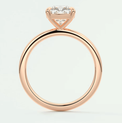 18k rose gold engagement ring with princess cut diamond.