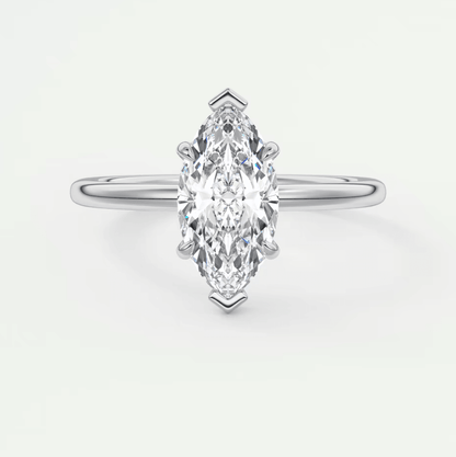 Marquise-cut diamond engagement ring with a white gold band, featuring an elegant and timeless design.