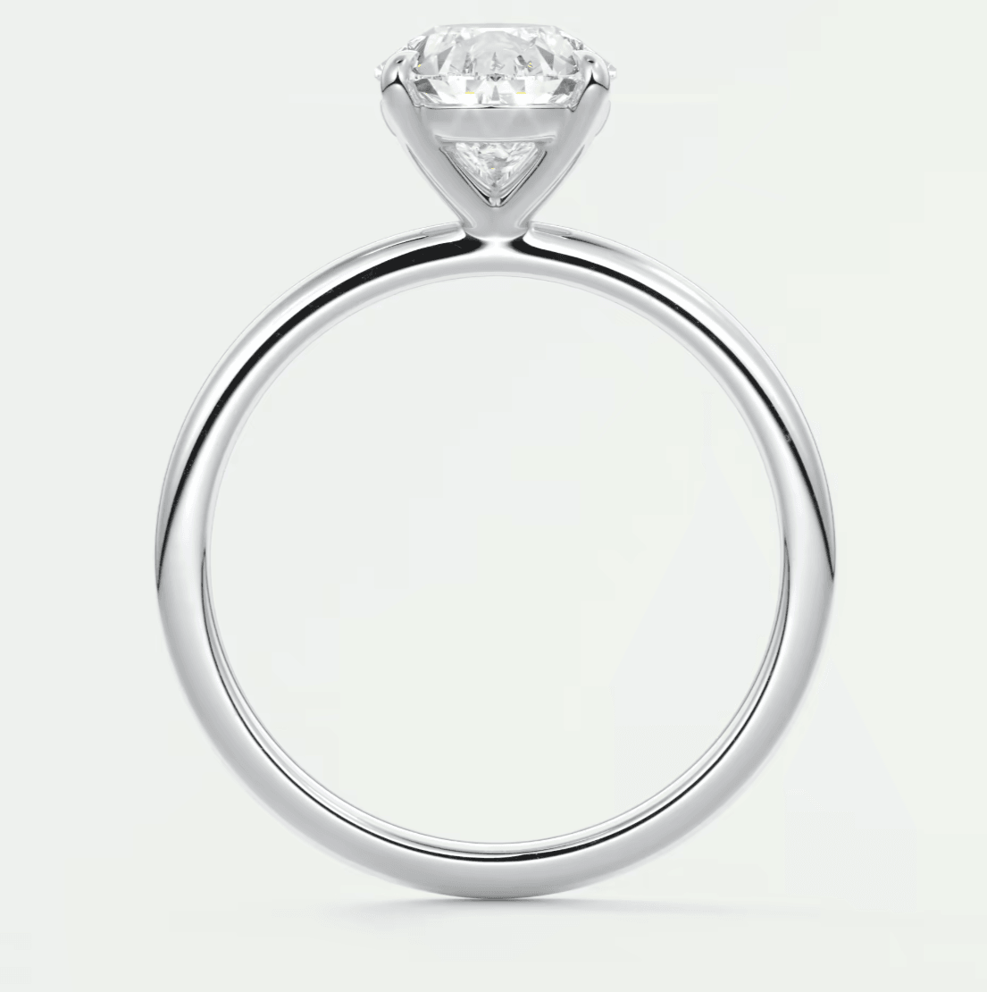 18k white gold solitaire diamond engagement ring.