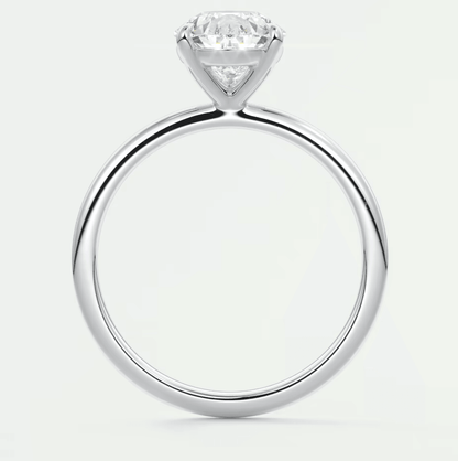 18k white gold solitaire diamond engagement ring.