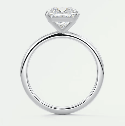 18k white gold engagement ring with a princess cut diamond.