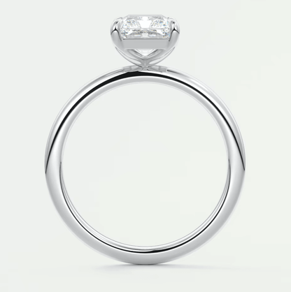 18-karat white gold engagement ring with a princess-cut diamond.