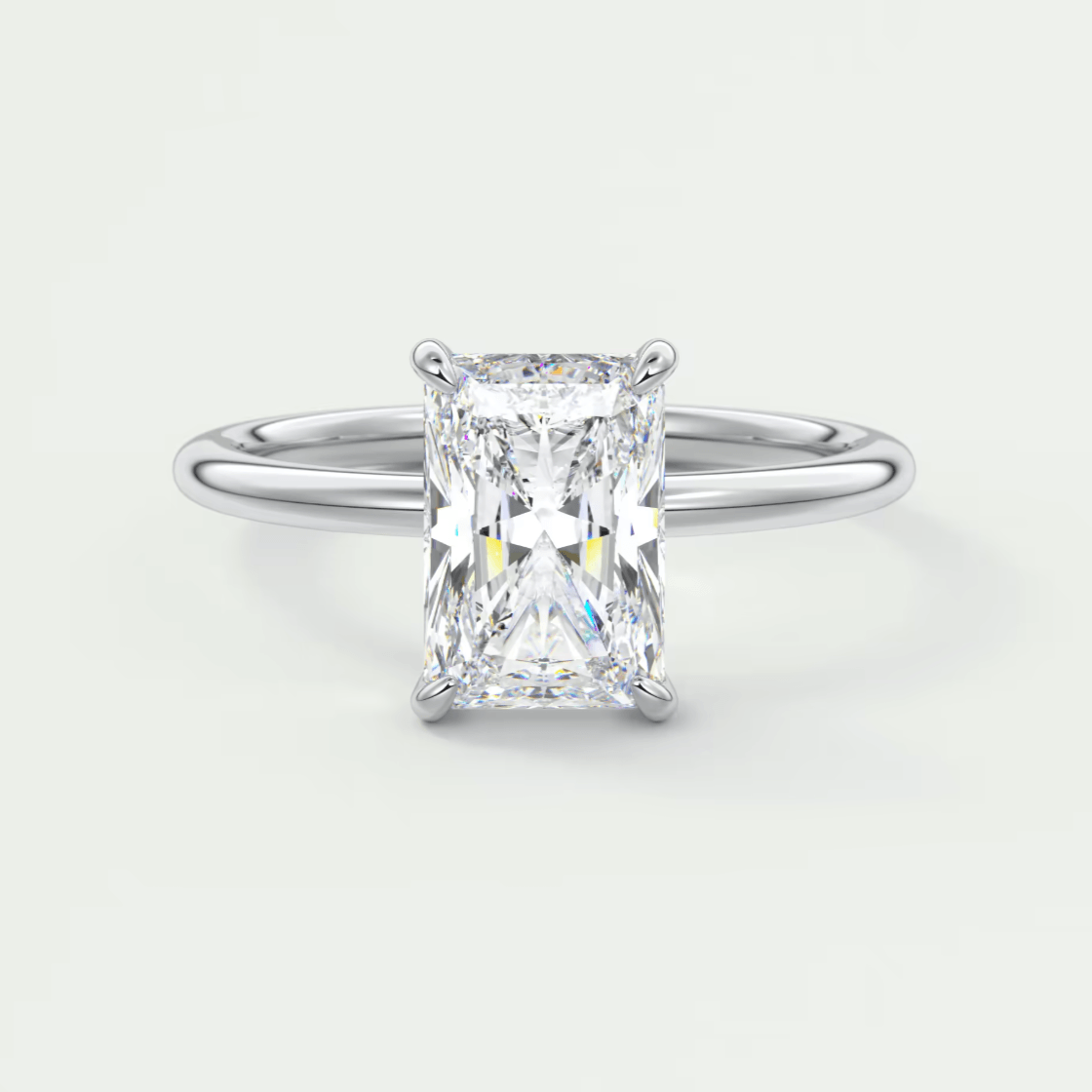 18k white gold emerald cut diamond engagement ring.