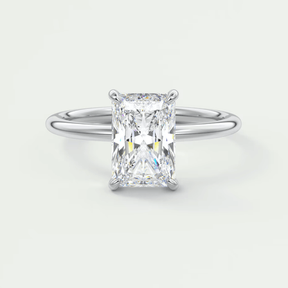18k white gold emerald cut diamond engagement ring.