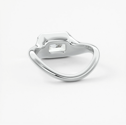 Lyra – east-west half bezel emerald engagement ring